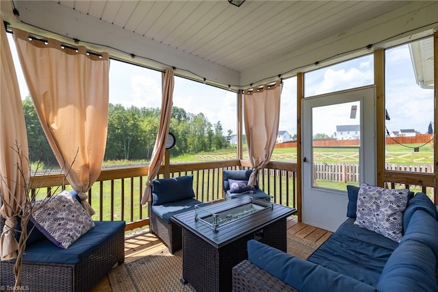 sunroom / solarium featuring a wealth of natural light