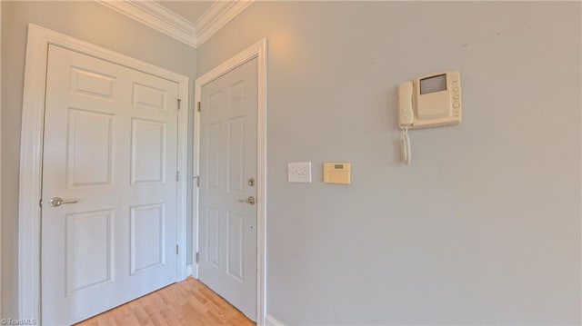 200 Lennox Dr Unit 3C, Jamestown, NC 27282 - doorway to outside with crown molding and light wood-type flooring