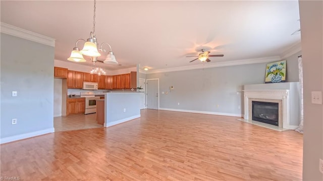 200 Lennox Dr Unit 3C, Jamestown, NC 27282 - unfurnished living room with ceiling fan, light wood-style flooring, a fireplace with flush hearth, a chandelier, and crown molding