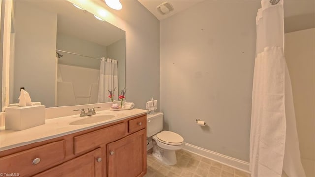 200 Lennox Dr Unit 3C, Jamestown, NC 27282 - full bathroom with vanity, toilet, baseboards, and curtained shower