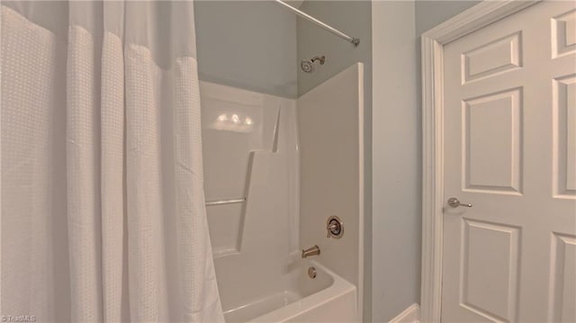 200 Lennox Dr Unit 3C, Jamestown, NC 27282 - bathroom featuring shower / bath combo with shower curtain