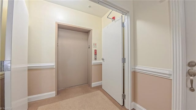 200 Lennox Dr Unit 3C, Jamestown, NC 27282 - hallway featuring elevator, baseboards, and carpet floors