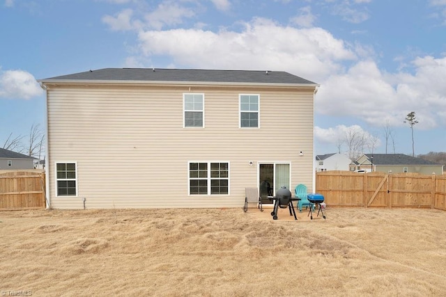 rear view of property with a patio area