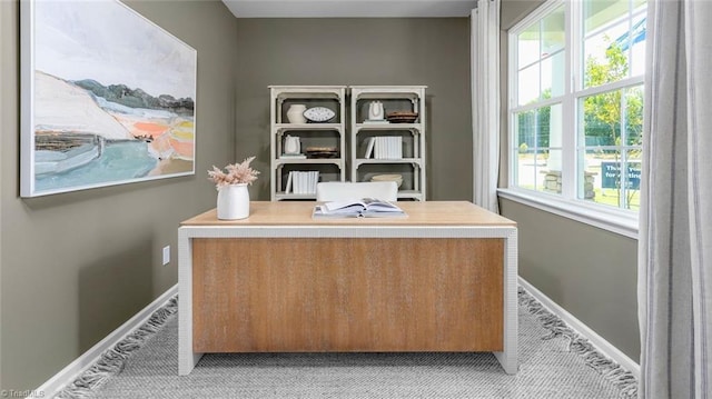 tiled office space featuring a wealth of natural light