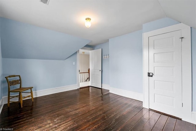 bonus room with hardwood / wood-style flooring, baseboards, and lofted ceiling