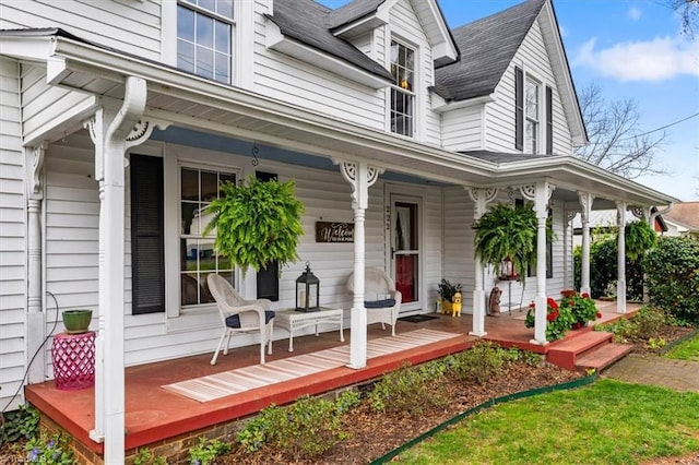 property entrance featuring covered porch