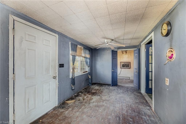 corridor with dark hardwood / wood-style flooring