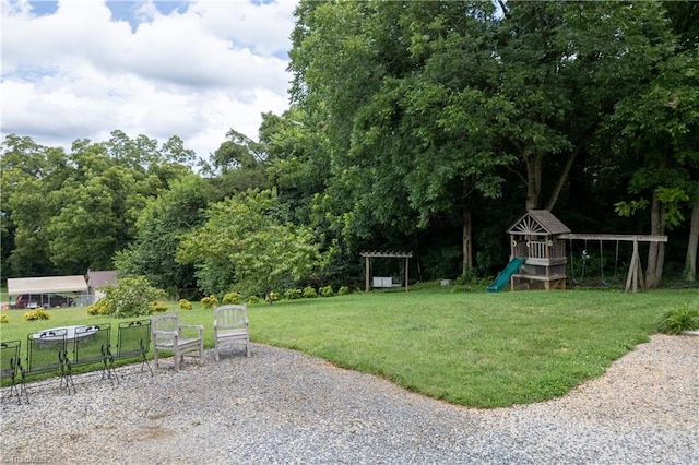 view of yard with a playground