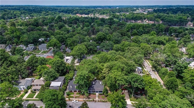 809 Simpson St, Greensboro, NC 27401 - aerial view of property and surrounding area with a heavily wooded area and nearby suburban area