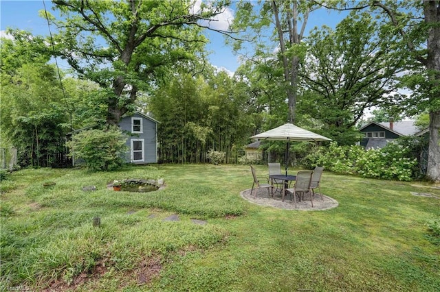 809 Simpson St, Greensboro, NC 27401 - view of green lawn featuring an outbuilding