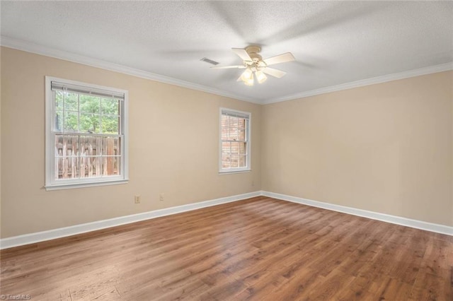 2704 Saint Johns Pl, Winston-Salem, NC 27106 - empty room featuring wood finished floors, ornamental molding, ceiling fan, baseboards, and a textured ceiling