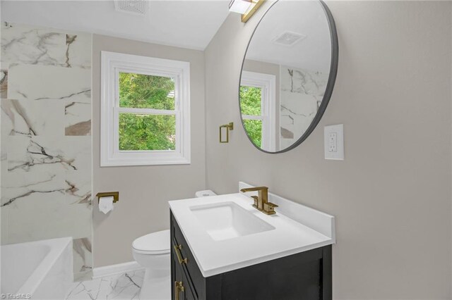 705 Laurel Ave, Lexington, NC 27292 - full bath featuring vanity, marble look tiles, toilet, and baseboards