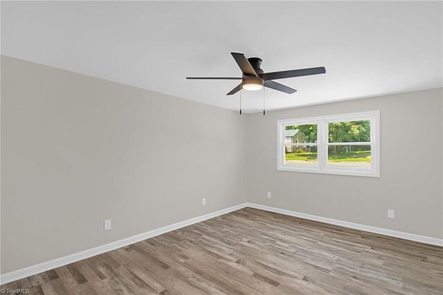 705 Laurel Ave, Lexington, NC 27292 - empty room featuring wood finished floors, a ceiling fan, and baseboards