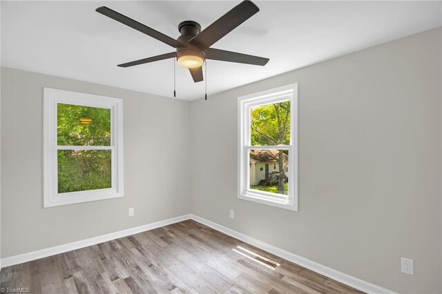 705 Laurel Ave, Lexington, NC 27292 - unfurnished room with wood finished floors, baseboards, and ceiling fan