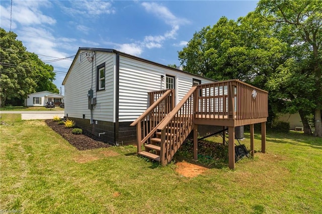 705 Laurel Ave, Lexington, NC 27292 - back of house with a wooden deck and a yard