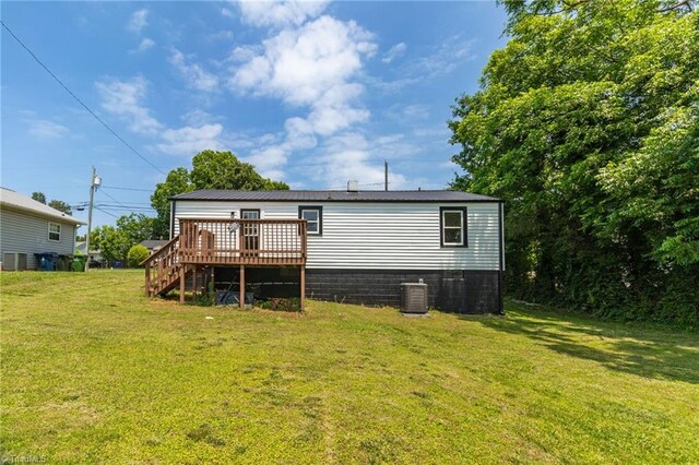705 Laurel Ave, Lexington, NC 27292 - back of property with a deck, a lawn, central AC unit, and crawl space