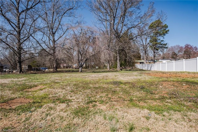 view of yard with fence