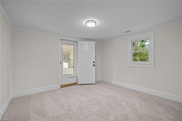 carpeted empty room with ornamental molding