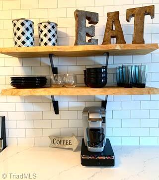 kitchen featuring light stone countertops