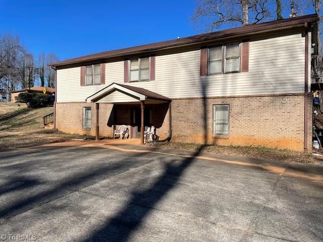 view of front of property with brick siding