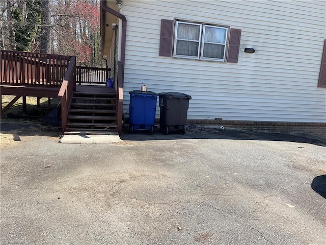 view of patio featuring stairs and a wooden deck