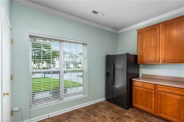 4339 Alderny Pl, High Point, NC 27265 - kitchen with black fridge with ice dispenser, ornamental molding, brown cabinetry, baseboards, and light countertops