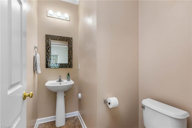 4339 Alderny Pl, High Point, NC 27265 - bathroom with toilet, baseboards, and a sink