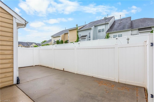 4339 Alderny Pl, High Point, NC 27265 - fenced backyard with a patio area and a residential view
