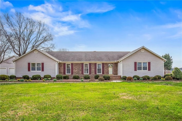 ranch-style house with a front yard and a garage