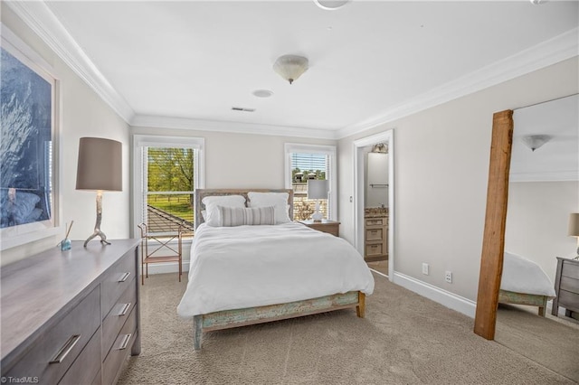 carpeted bedroom with ornamental molding