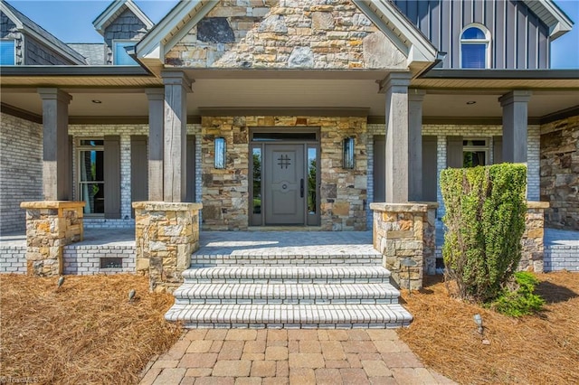 entrance to property with a porch