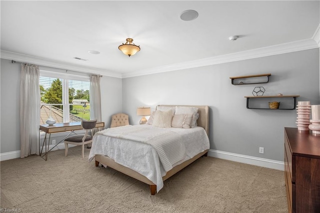 bedroom with crown molding and light colored carpet