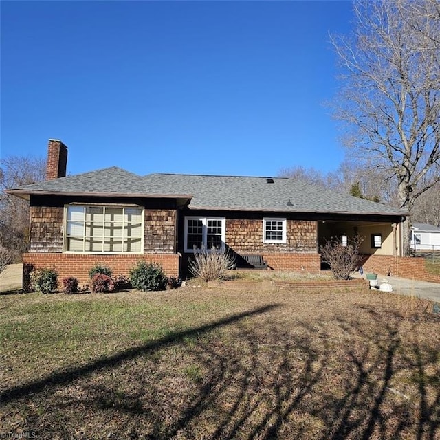 ranch-style home with a front yard