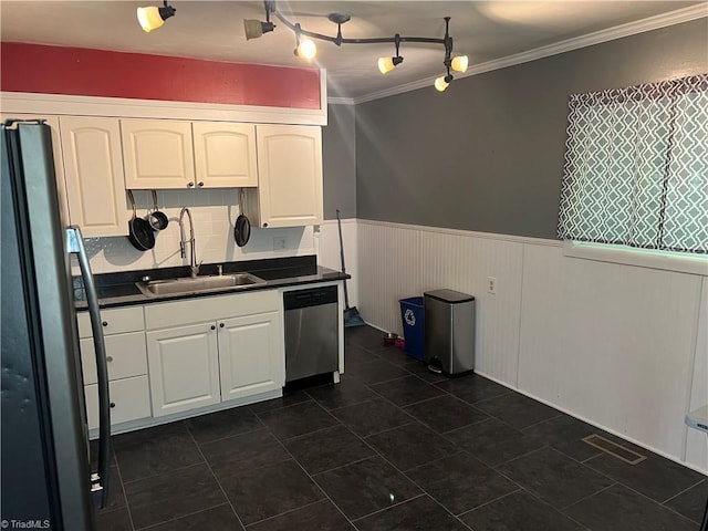 240 Byerly St, Mount Airy, NC 27030 - kitchen with freestanding refrigerator, dishwasher, dark countertops, a sink, and a wainscoted wall