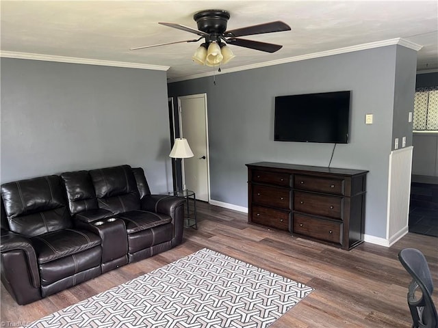 240 Byerly St, Mount Airy, NC 27030 - living area featuring wood finished floors, ceiling fan, baseboards, and ornamental molding