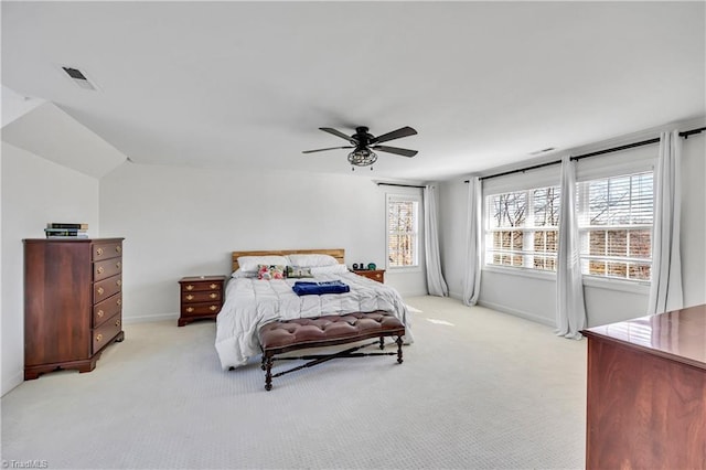 bedroom featuring light colored carpet and ceiling fan