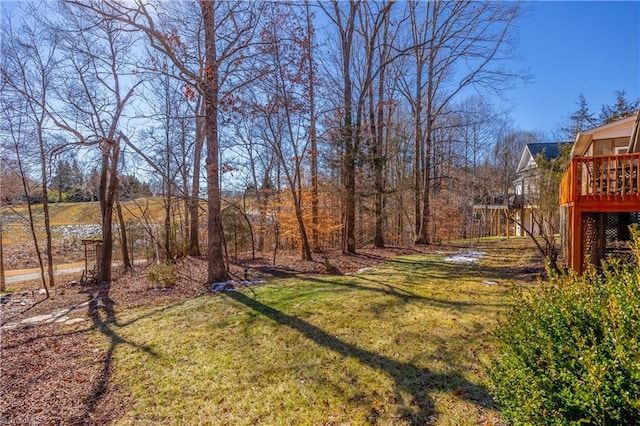 view of yard featuring a wooden deck