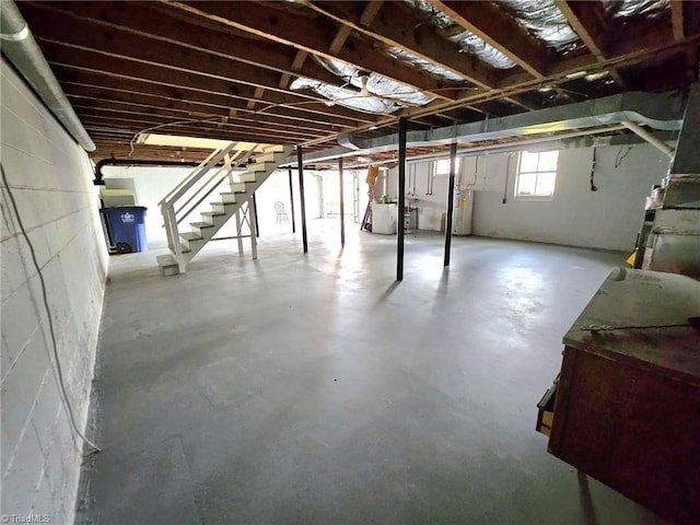 basement featuring electric water heater