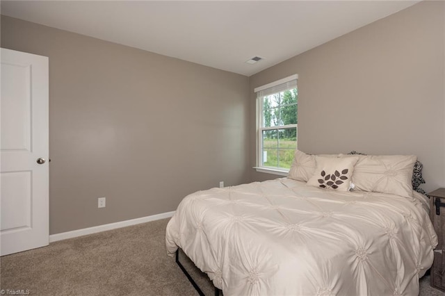 4628 Heatherly Rd, Winston-Salem, NC 27105 - bedroom with carpet floors and baseboards