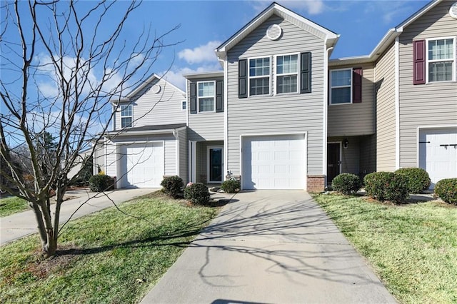 view of front of home with a garage and a front lawn