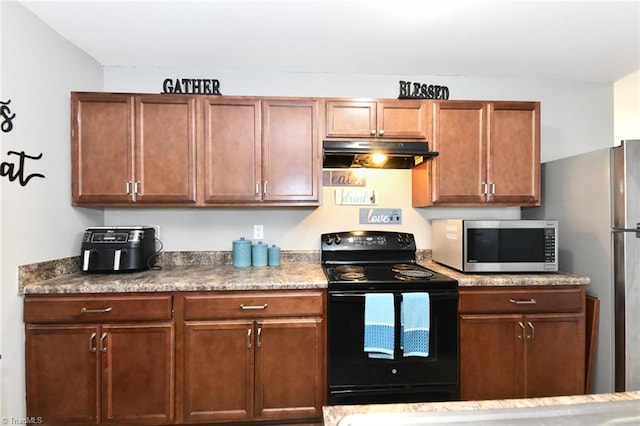 kitchen featuring black / electric stove