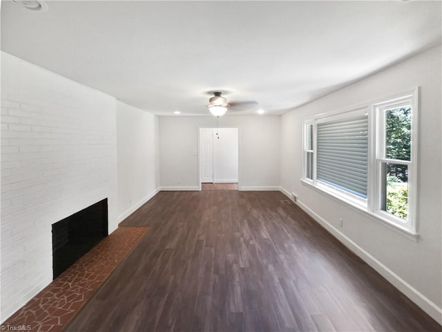 3230 High Cliffs Rd, Pfafftown, NC 27040 - unfurnished living room with ceiling fan, dark wood-style flooring, and a fireplace