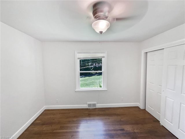 3230 High Cliffs Rd, Pfafftown, NC 27040 - unfurnished bedroom featuring wood finished floors, a closet, and a ceiling fan