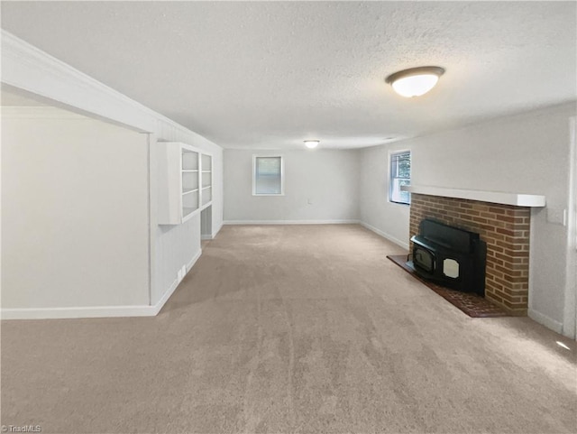 3230 High Cliffs Rd, Pfafftown, NC 27040 - unfurnished living room with carpet, a textured ceiling, and a wood stove