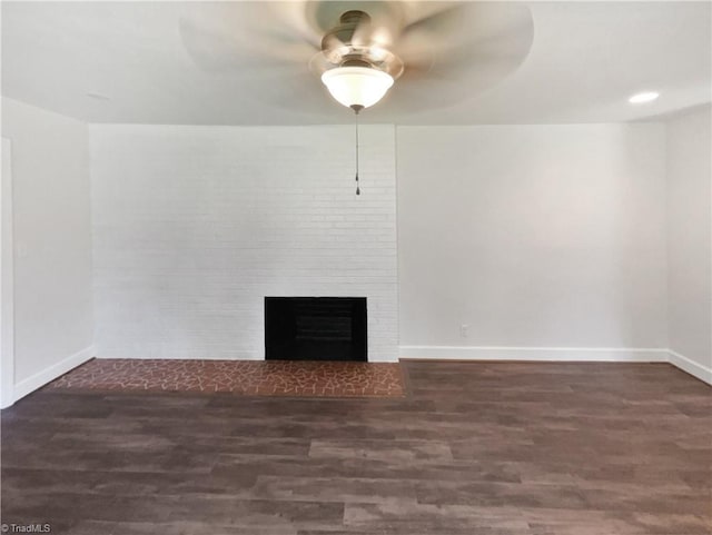 3230 High Cliffs Rd, Pfafftown, NC 27040 - unfurnished living room with a ceiling fan, wood finished floors, and a brick fireplace