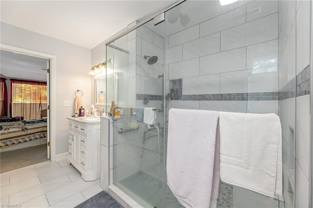 4680 Sherborne Dr, Pfafftown, NC 27040 - ensuite bathroom with vanity, a shower stall, and marble look tiles