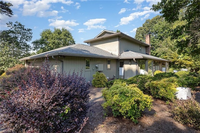 4680 Sherborne Dr, Pfafftown, NC 27040 - rear view of house with a chimney
