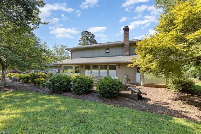 4680 Sherborne Dr, Pfafftown, NC 27040 - back of property featuring a yard and a chimney
