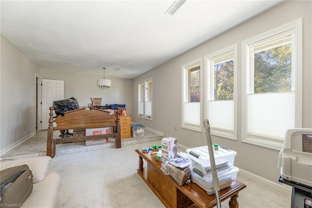 4680 Sherborne Dr, Pfafftown, NC 27040 - living area with light colored carpet and baseboards