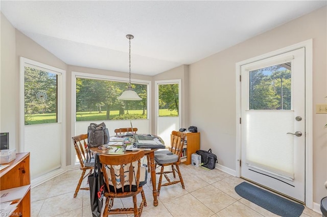 4680 Sherborne Dr, Pfafftown, NC 27040 - dining room with lofted ceiling and light tile patterned floors